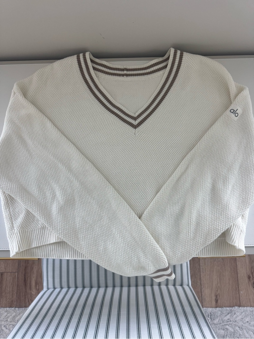 ALO Yoga Cream V-Neck Sweater with Brown Contrast Trim